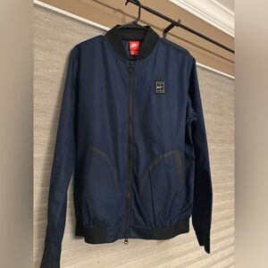 Nike blue zip up golf waterproof jacket